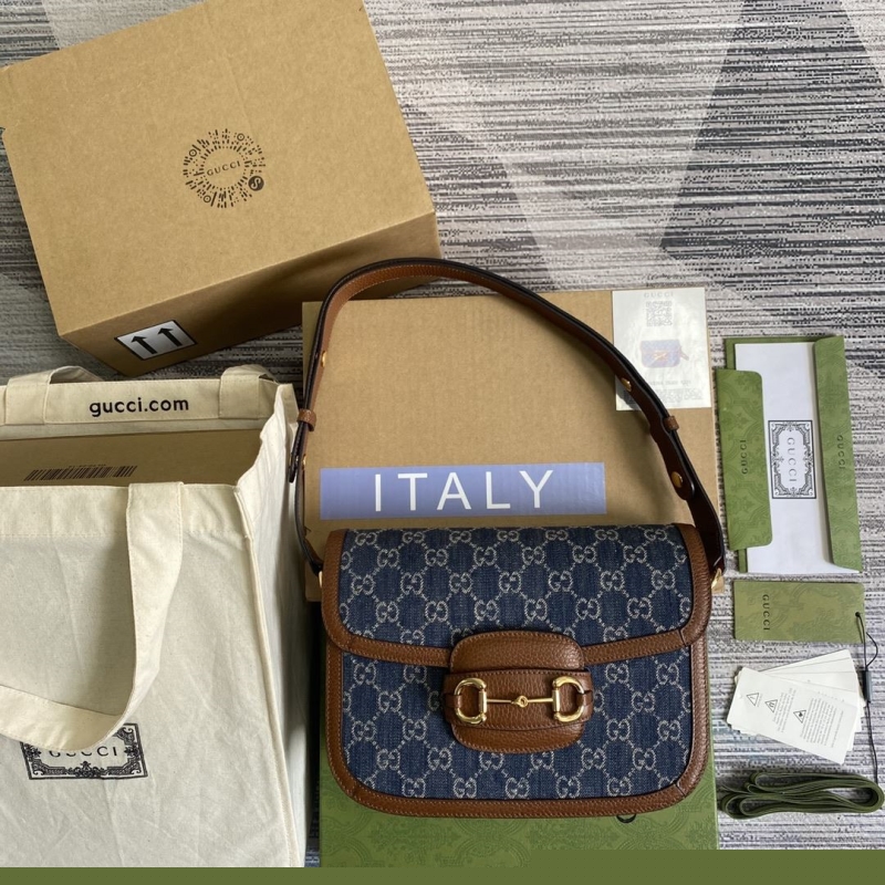 G*u*i top handle bags